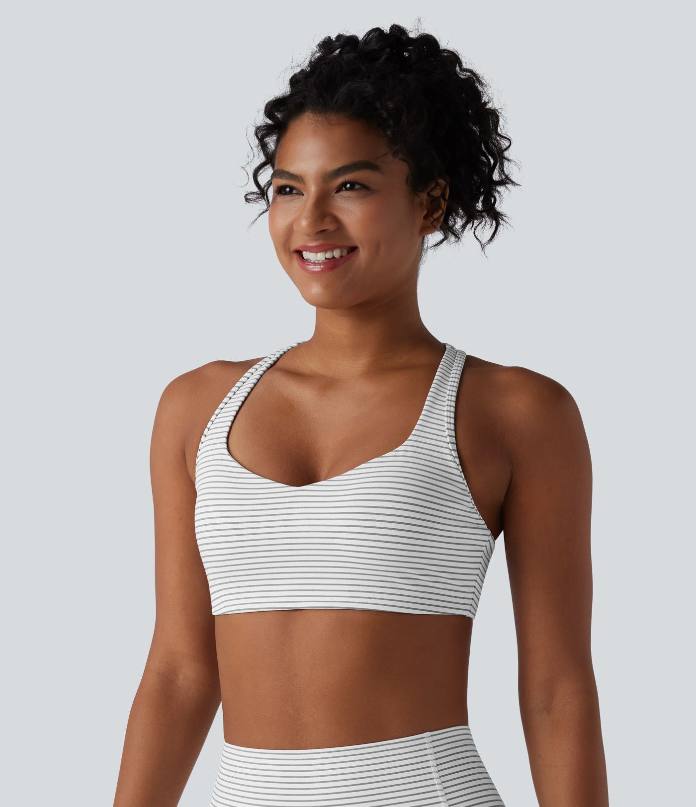 Brassière de sport d'entraînement soutien moyen dos nageur à rayures
