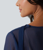 Chemise casual transparente col V manches longues à volants
