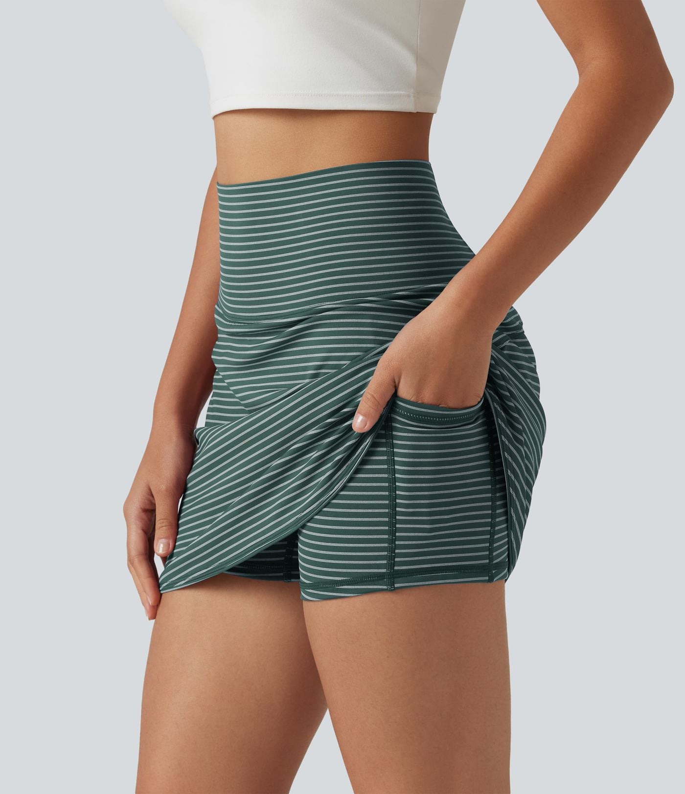 Mini-jupe de golf 2 en 1 à rayures, taille ultra haute, effet ventre plat, ourlet arrondi et poches