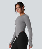 Top de sport yoga col rond ourlet asymétrique fendu manches longues avec trous pouces