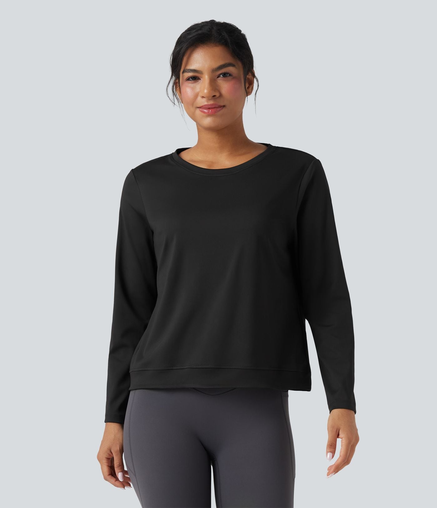 Top de sport running col rond manches longues à découpes
