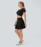 Jupe-short de tennis courte plissée 2-en-1 gainante taille haute à séchage rapide avec poches Breezeful™