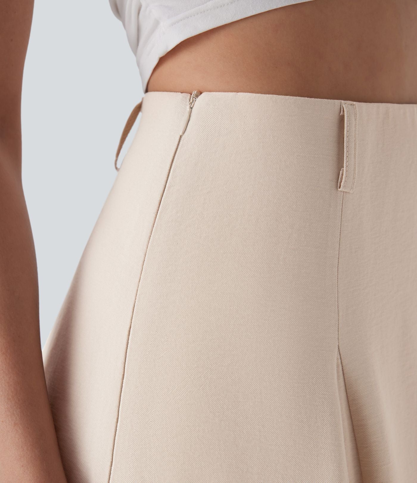 Jupe longue évasée à taille haute avec fermeture éclair invisible, aspect lin