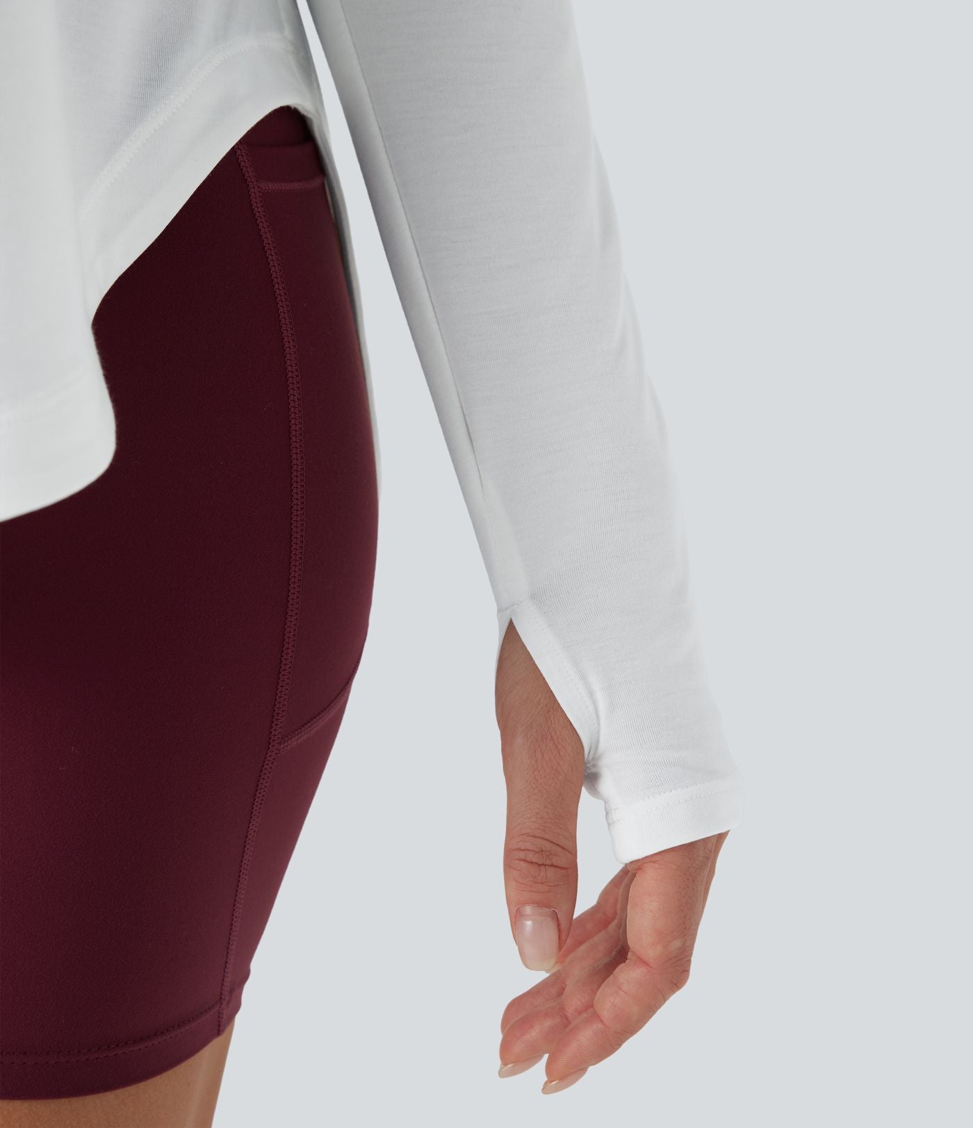 Top yoga sport séchage rapide une épaule manches longues trous pouces ourlet arrondi haut-bas
