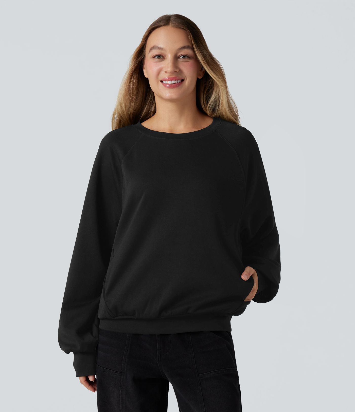 Sweat-shirt col rond manches longues à découpes avec poches