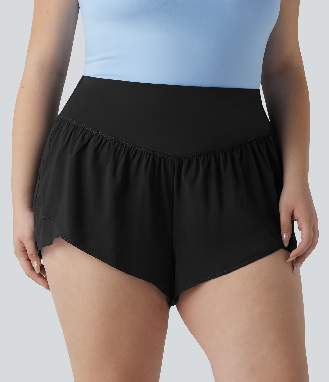 Short de yoga grande taille Breezeful™ à taille haute, ourlet croisé, séchage rapide et poche