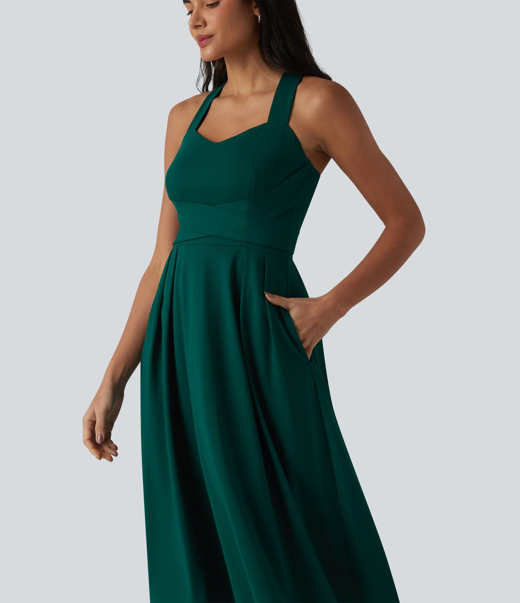 Robe midi fluide sans manches décolleté cœur avec bretelles croisées, nœud dans le dos et poches