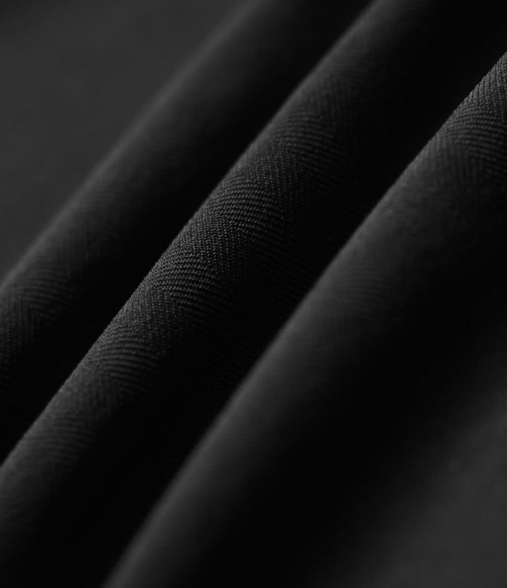 Bermuda ample infroissable taille haute plissé aspect lin avec fermeture éclair invisible et poches