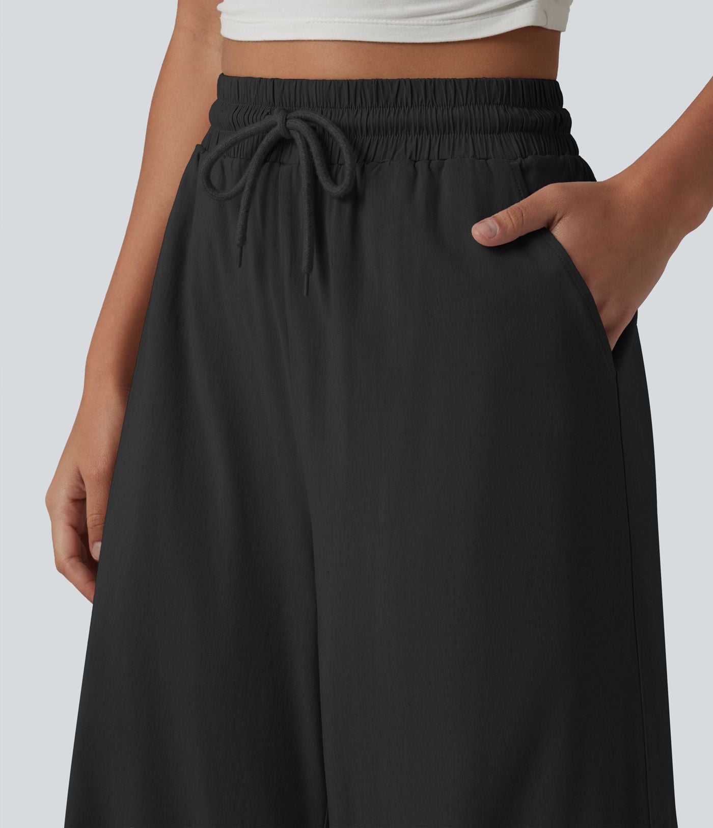 Pantalon large fluide en lin stretch taille haute avec cordon de serrage et poches