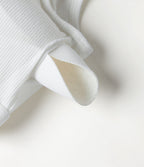 Débardeur en maille côtelée à encolure arrondie, dos en U, dentelle contrastée et coussinets amovibles