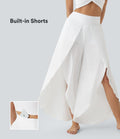 Breezeful™  Pantalon Large Casual 2 en 1 Palazzo Flowy Taille Haute Poches Fente à la Taille Arrière - Séchage Rapide