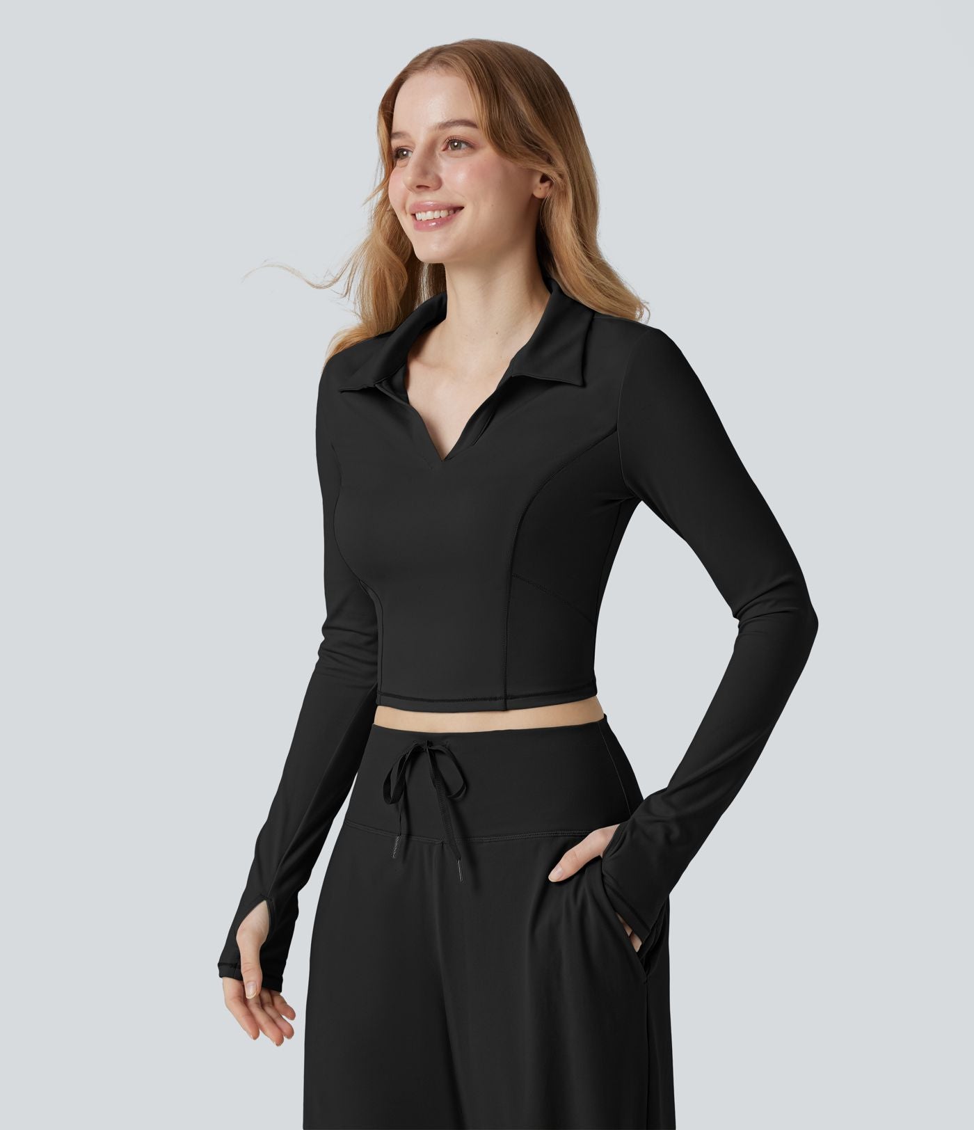 Top de sport tennis SoftlyZero™ Plush court col polo manches longues avec trous pouces