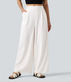 Pantalon tailleur large, taille moyenne, à poches