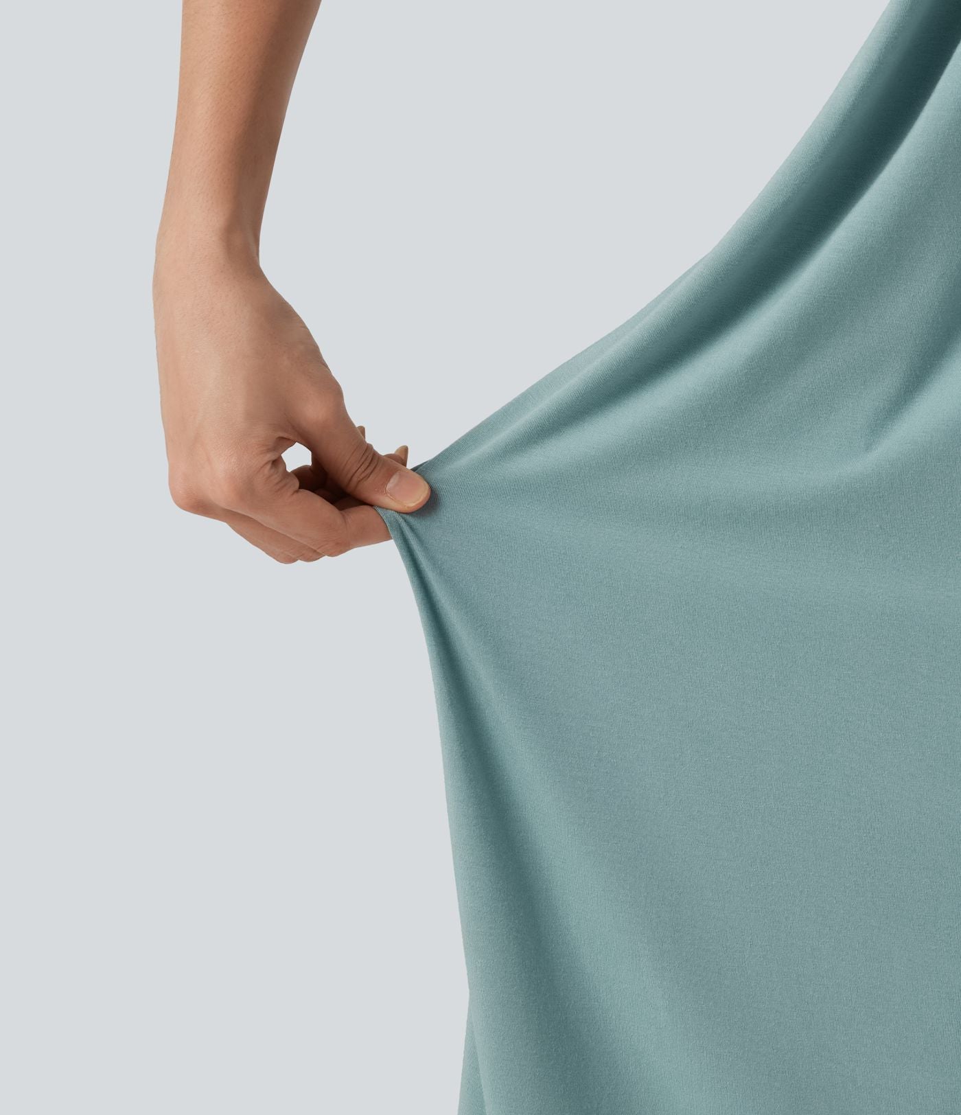 Robe midi de plage à col halter avec brassière intégrée, lien noué au dos et poches