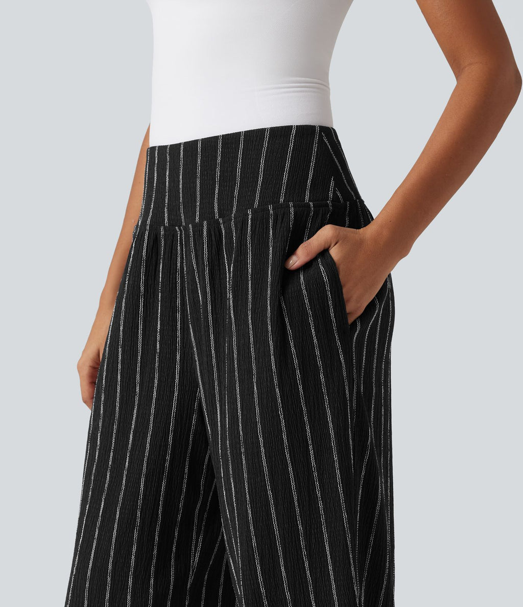 Pantalon rayé taille haute avec ourlet arrondi et poches
