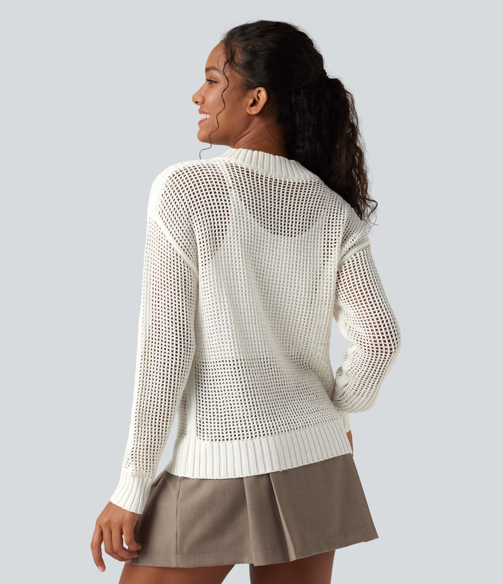 Pull ajouré demi-zip col rond manches longues