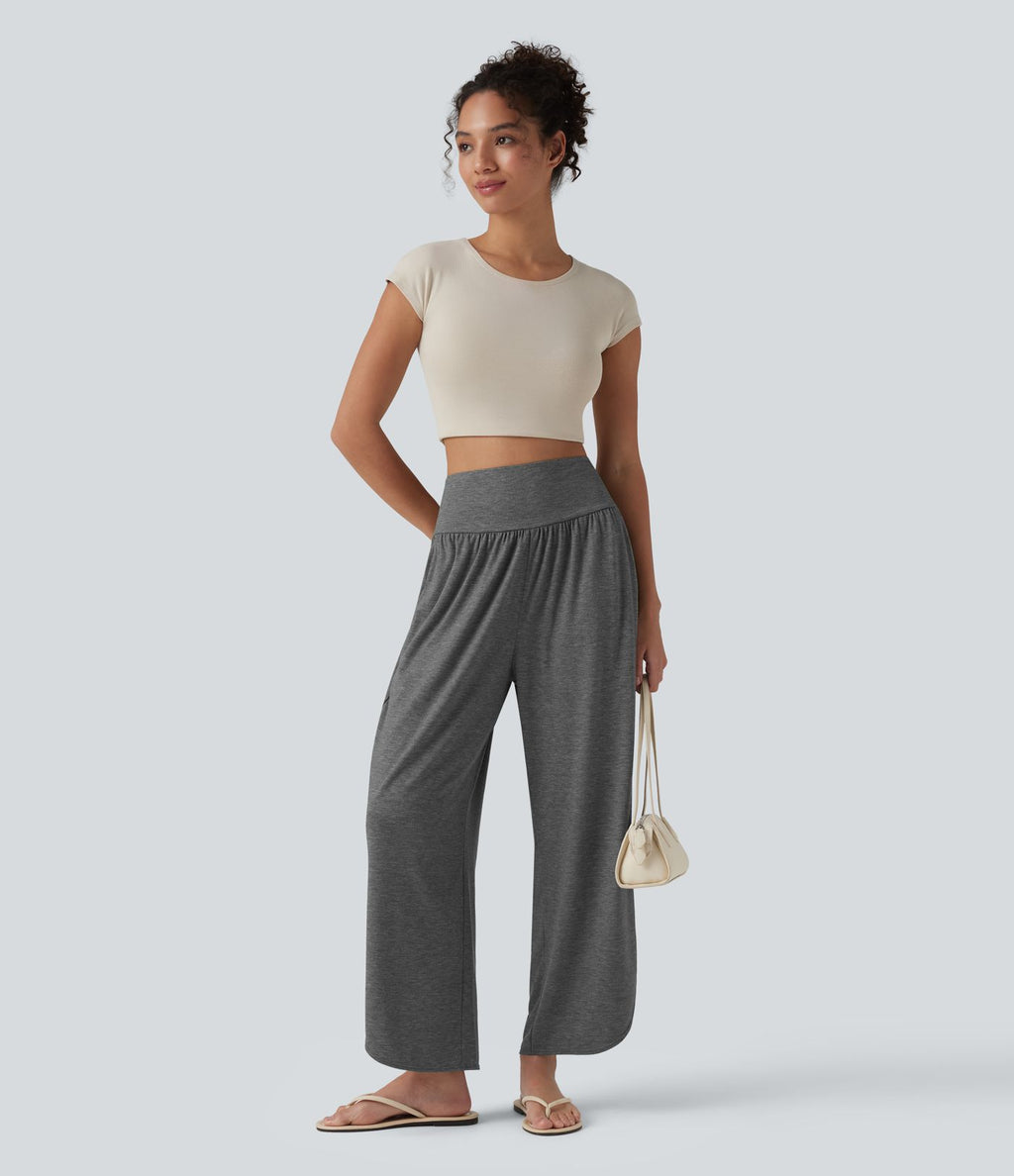 Pantalon décontracté taille haute gainant avec ourlet arrondi et poches