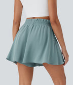Short large décontracté taille haute façon paperbag avec cordon, poches latérales et aspect lin