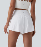 Short yoga 2-en-1 gainant taille haute à pois réfléchissants, ourlet arrondi croisé et œillets avec poches