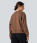 Sweat en coton molleton col rond manches longues avec poches