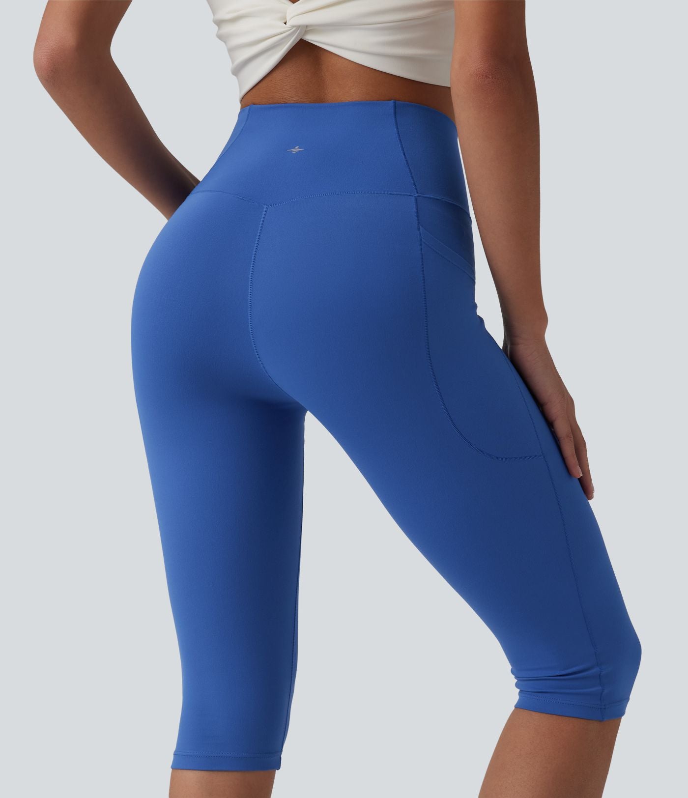 Legging de yoga corsaire SoftlyZero™ taille haute croisé avec poches - UPF50+