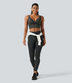 Brassière de sport push-up rayée à maintien léger, avec coussinets fixes, idéale pour le yoga.