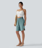 Short taille haute croisé séchage rapide avec ourlet arrondi Breezeful™ et poches
