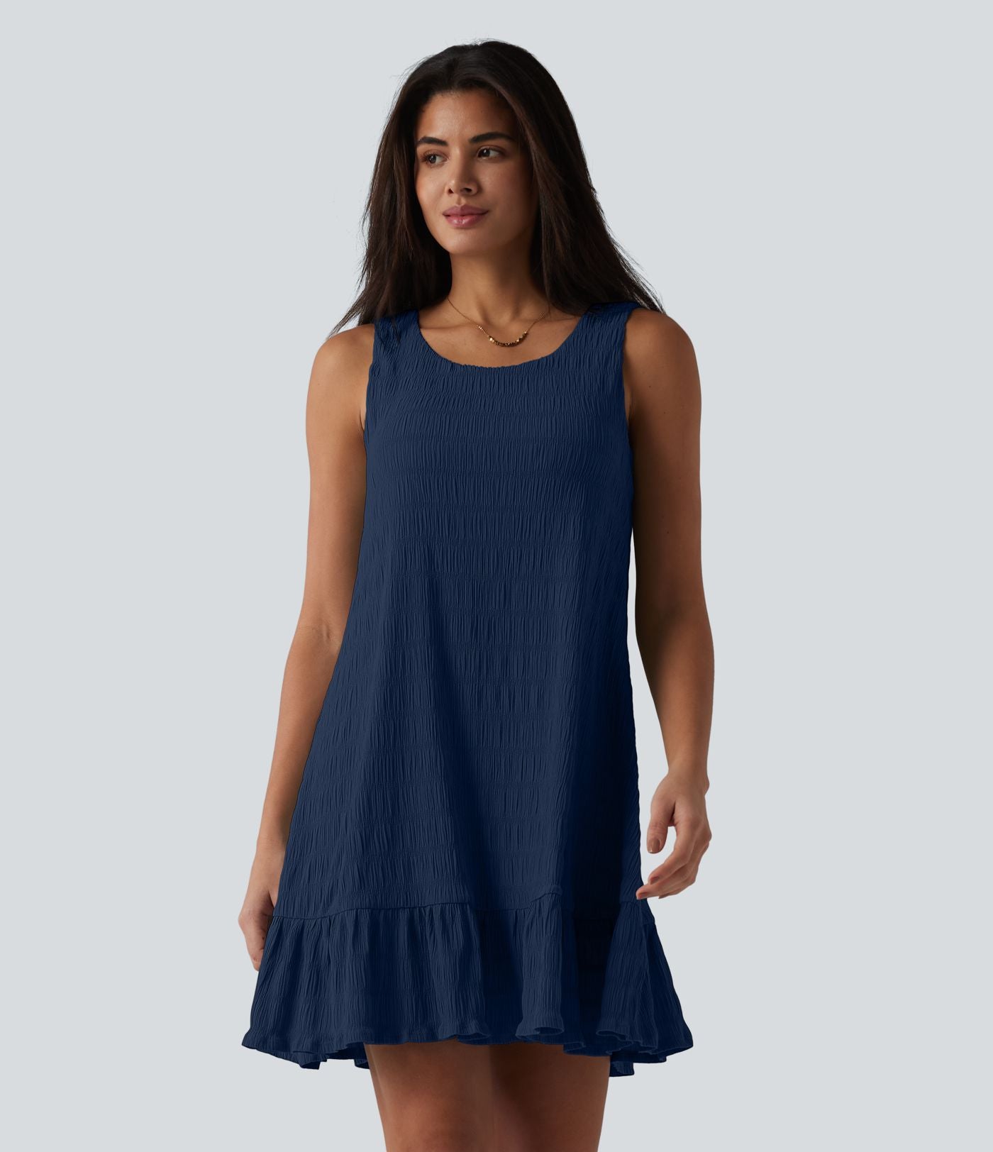 Robe courte décontractée sans manches à col rond, soutien-gorge intégré et ourlet à volants