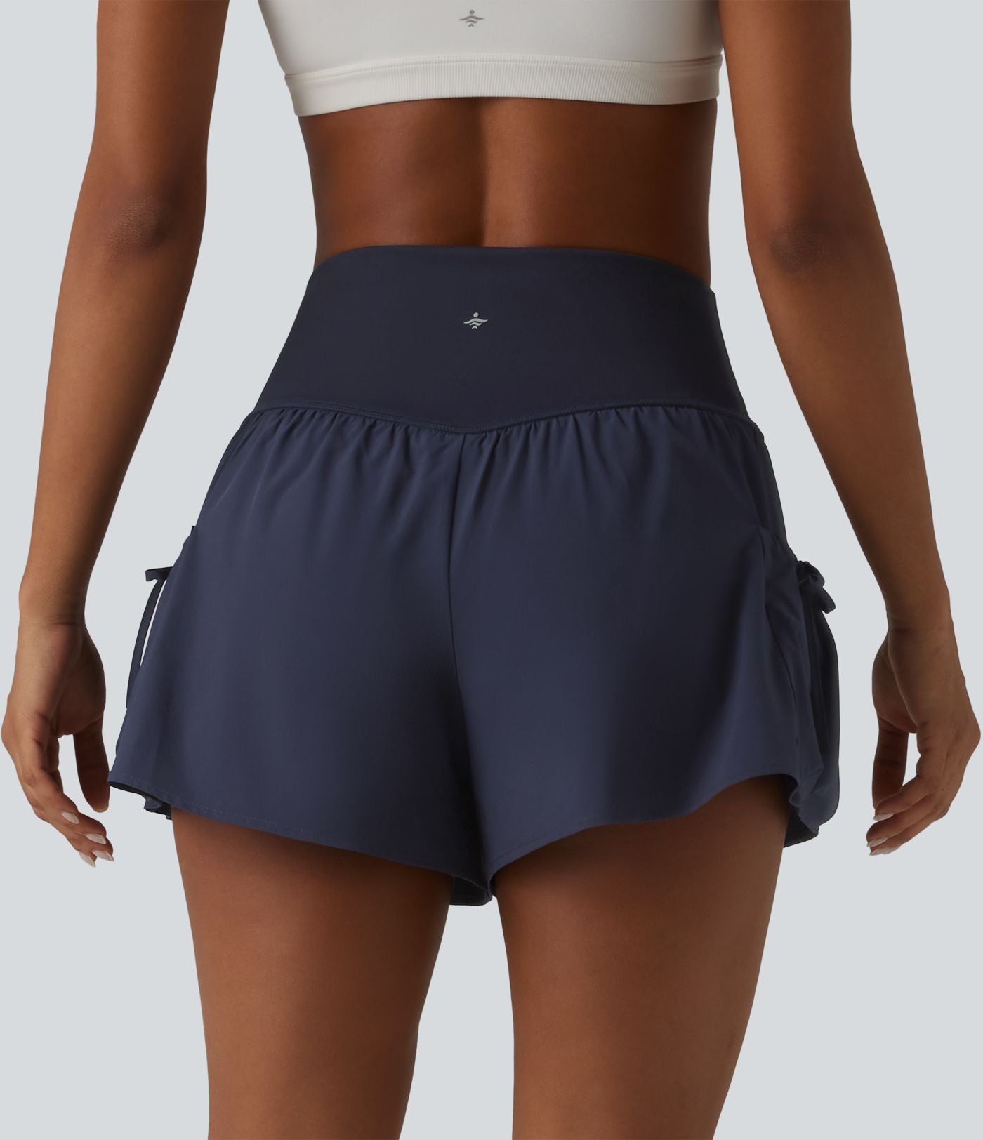 Short de sport ample 2 en 1 taille haute avec poches