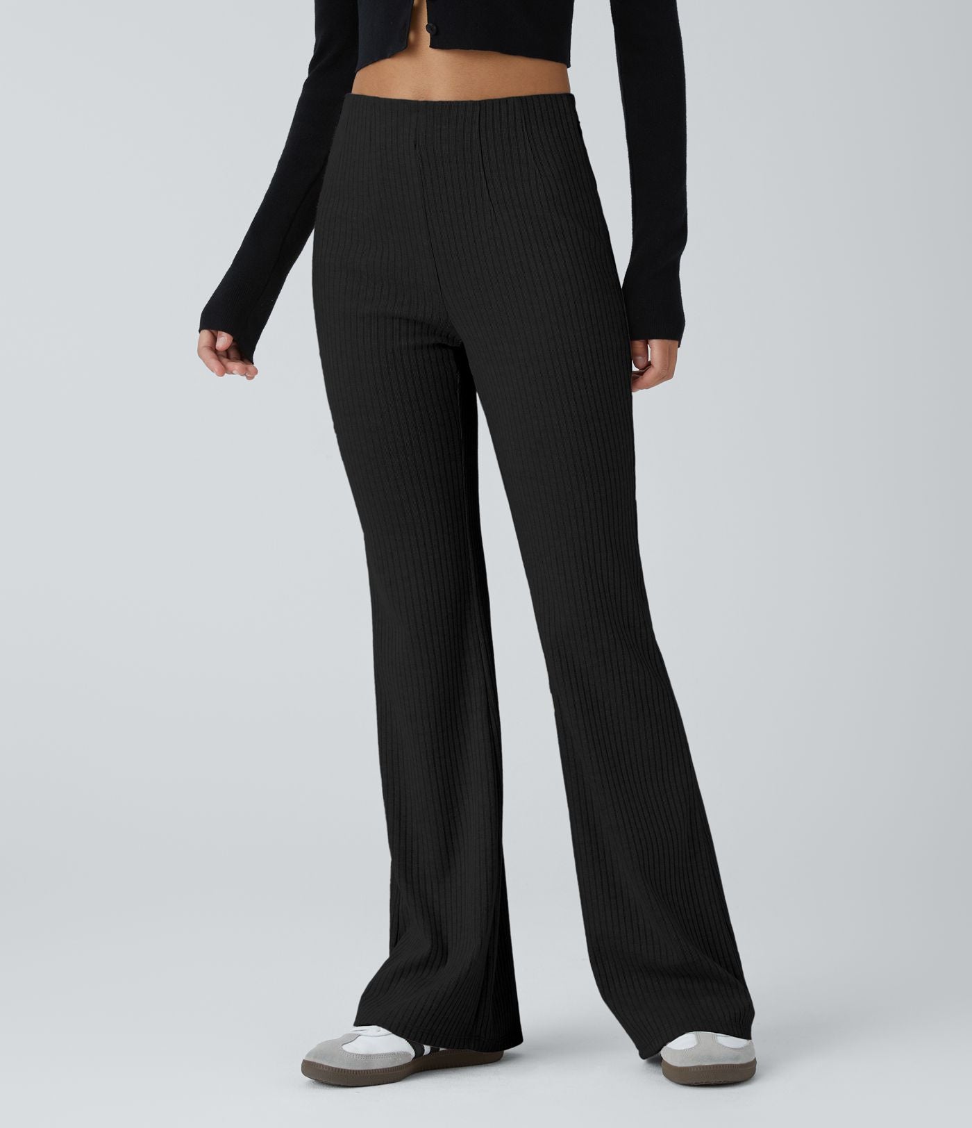 Pantalon décontracté évasé en maille côtelée à taille haute et poches zippées latérales