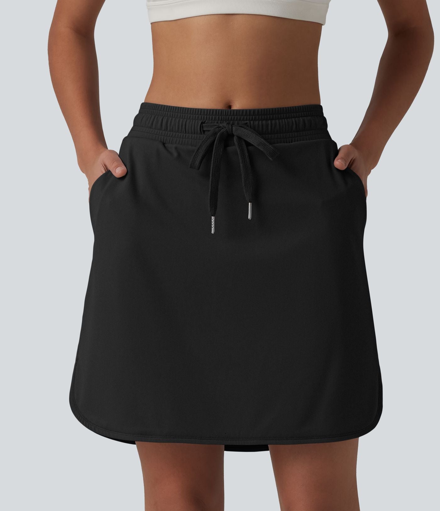 Jupe de sport 2 en 1 SoftlyZero™ Airy, taille mi-haute, ourlet incurvé et cordon de serrage, avec poches