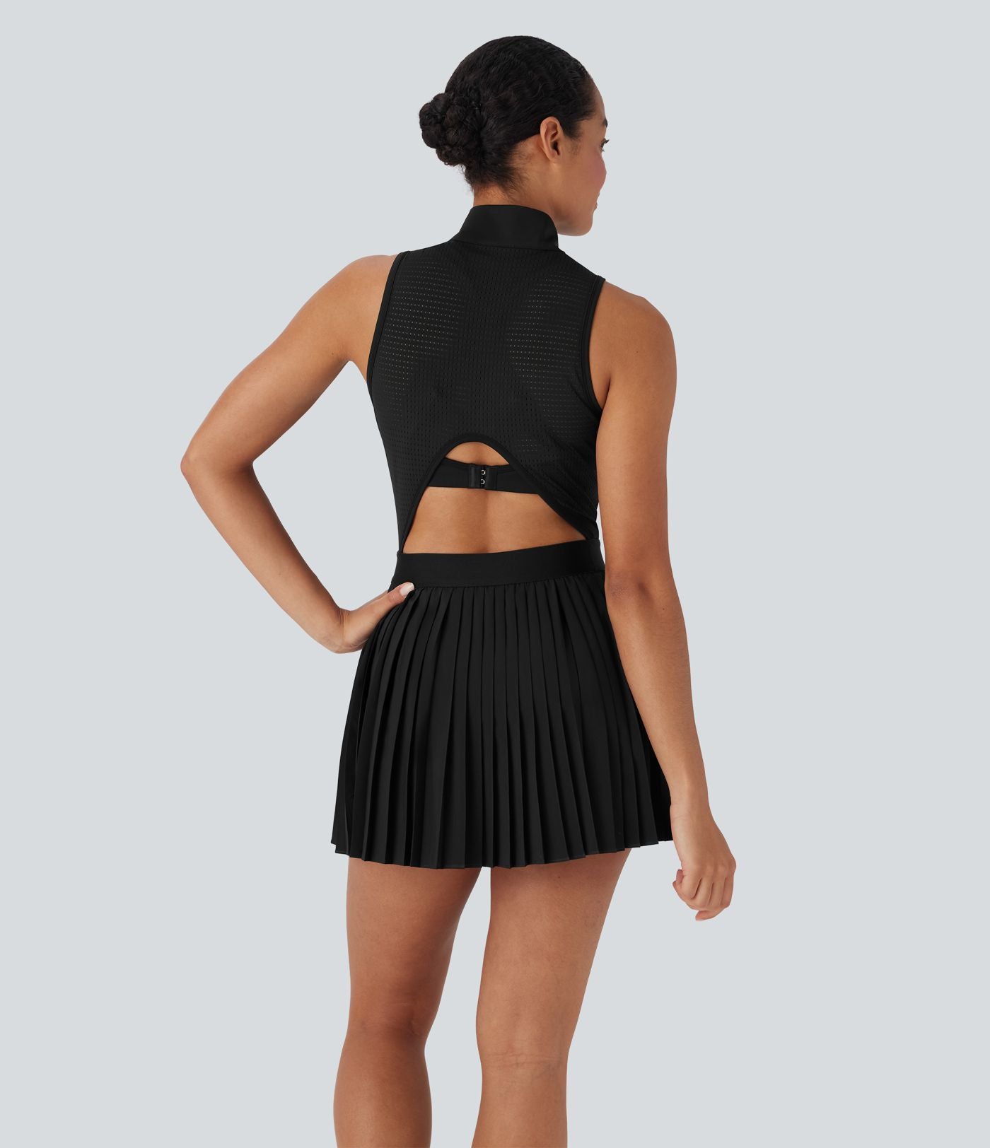 Robe de tennis courte 2-en-1 sans manches ajourée plissée à séchage rapide Breezeful™ avec poches latérales