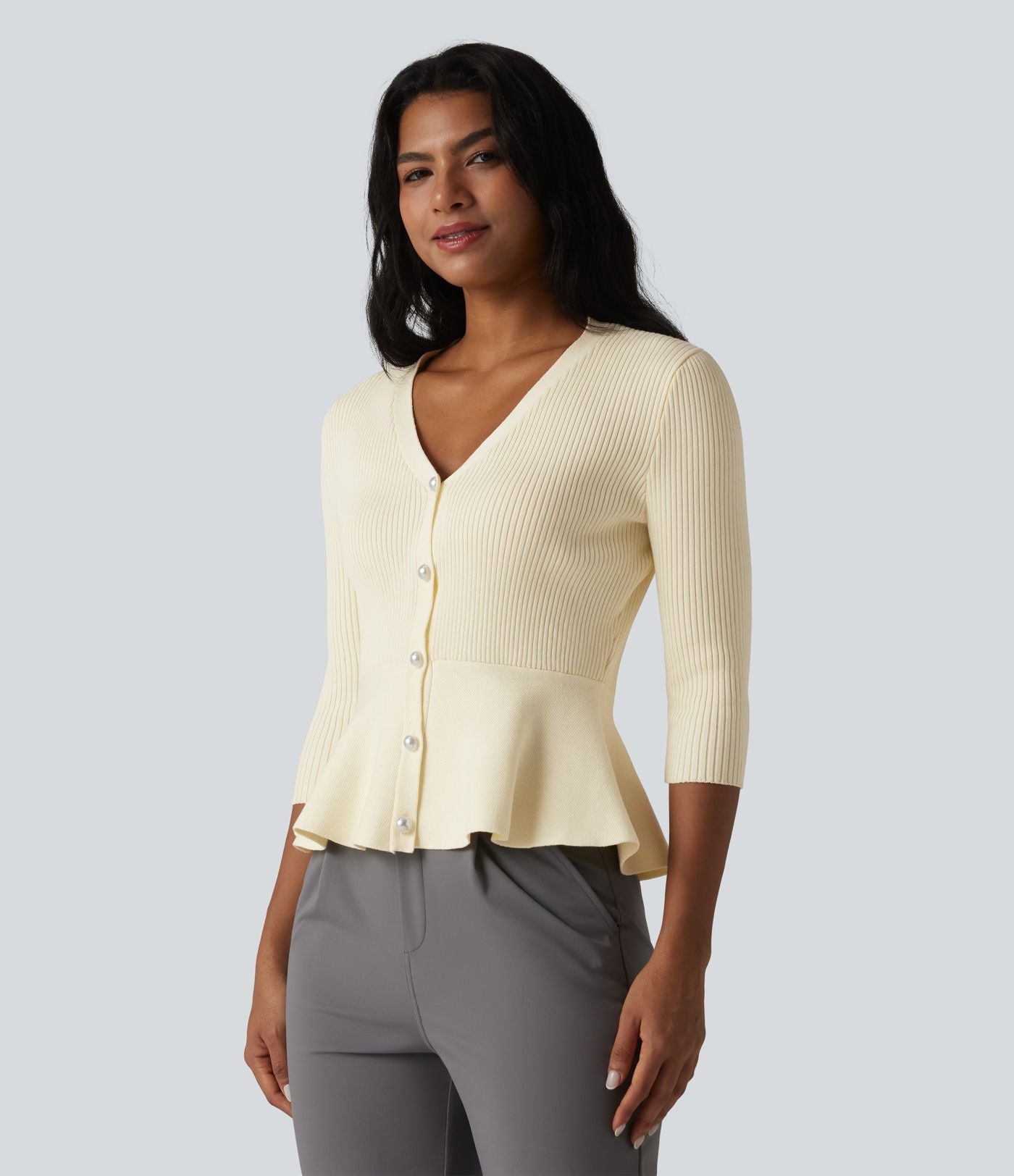 Gilet péplum à col en V et manches 3/4