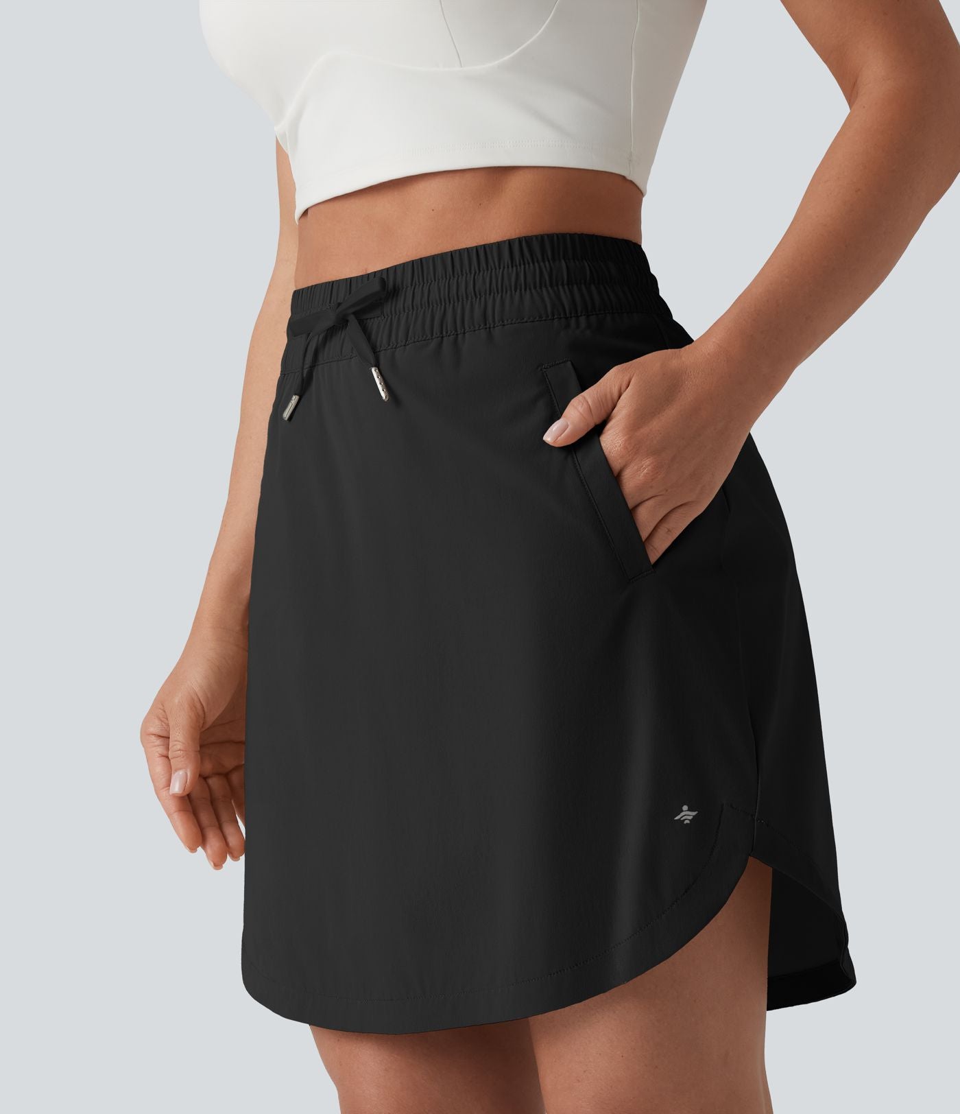 Jupe-short golf mini 2-en-1 taille haute à cordon de serrage et ourlet arrondi avec poches - Longueur plus longue