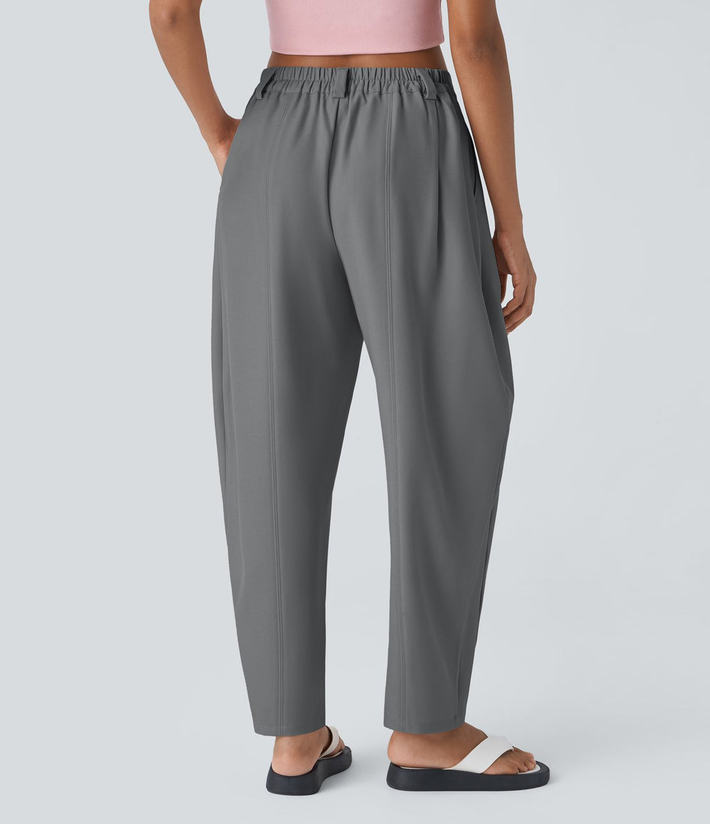Pantalon tailleur ample, taille moyenne, coupe barrel, à poches