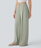 Pantalon large et fluide aspect lin taille haute, boutonné avec poches