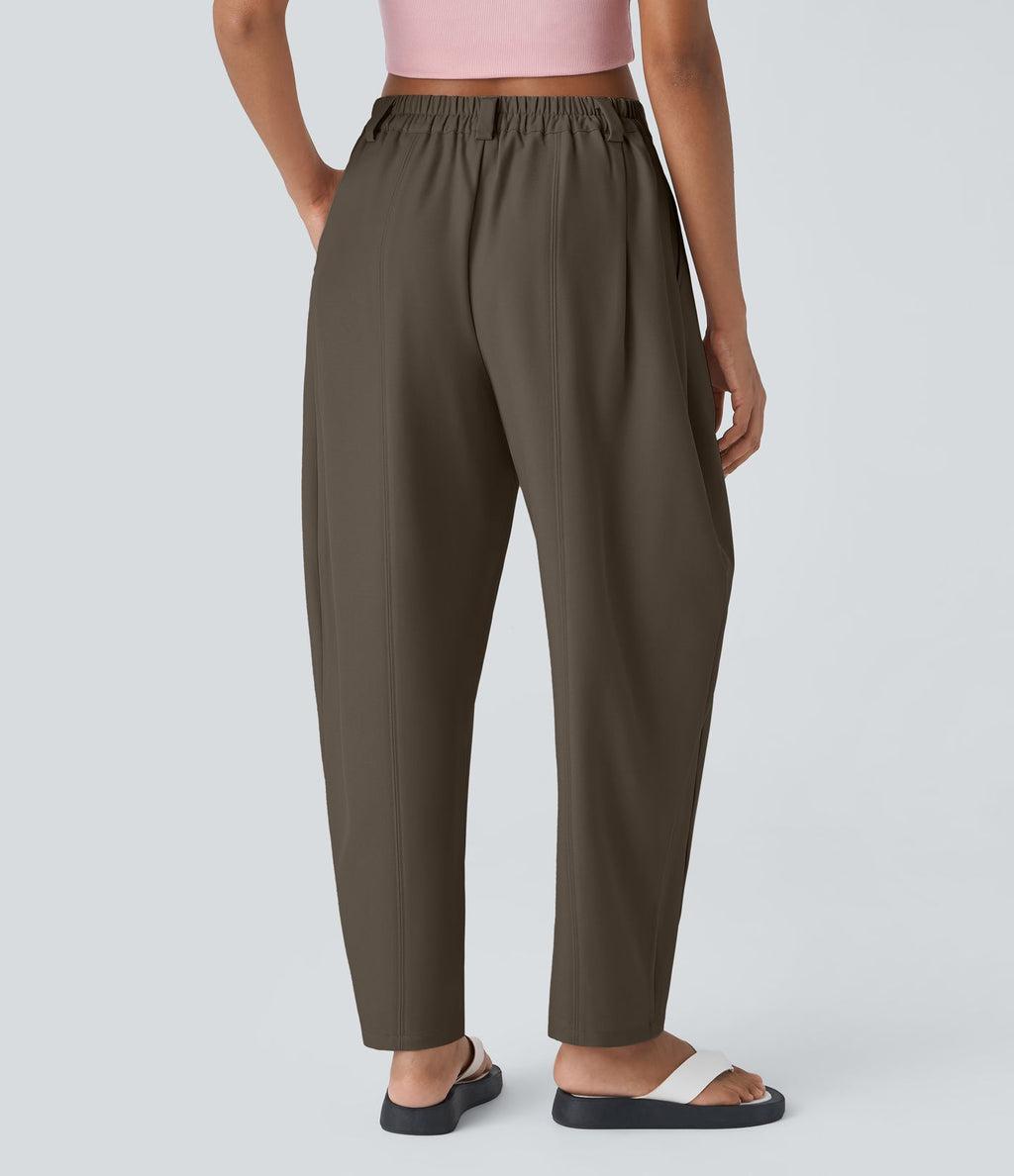 Pantalon tailleur ample, taille moyenne, coupe barrel, à poches