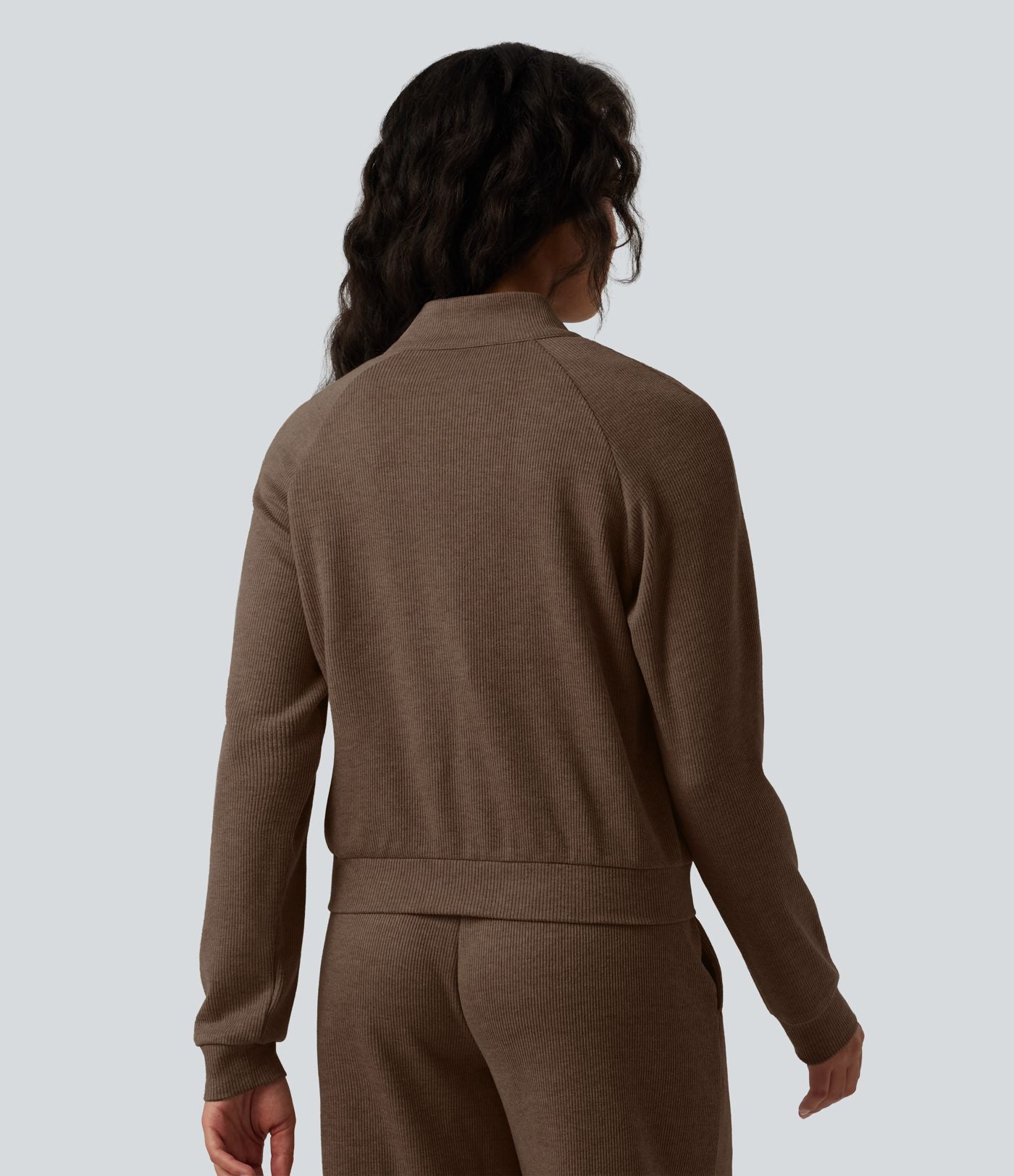 Veste casual côtelée à col montant, manches longues et fermeture zippée avec poches