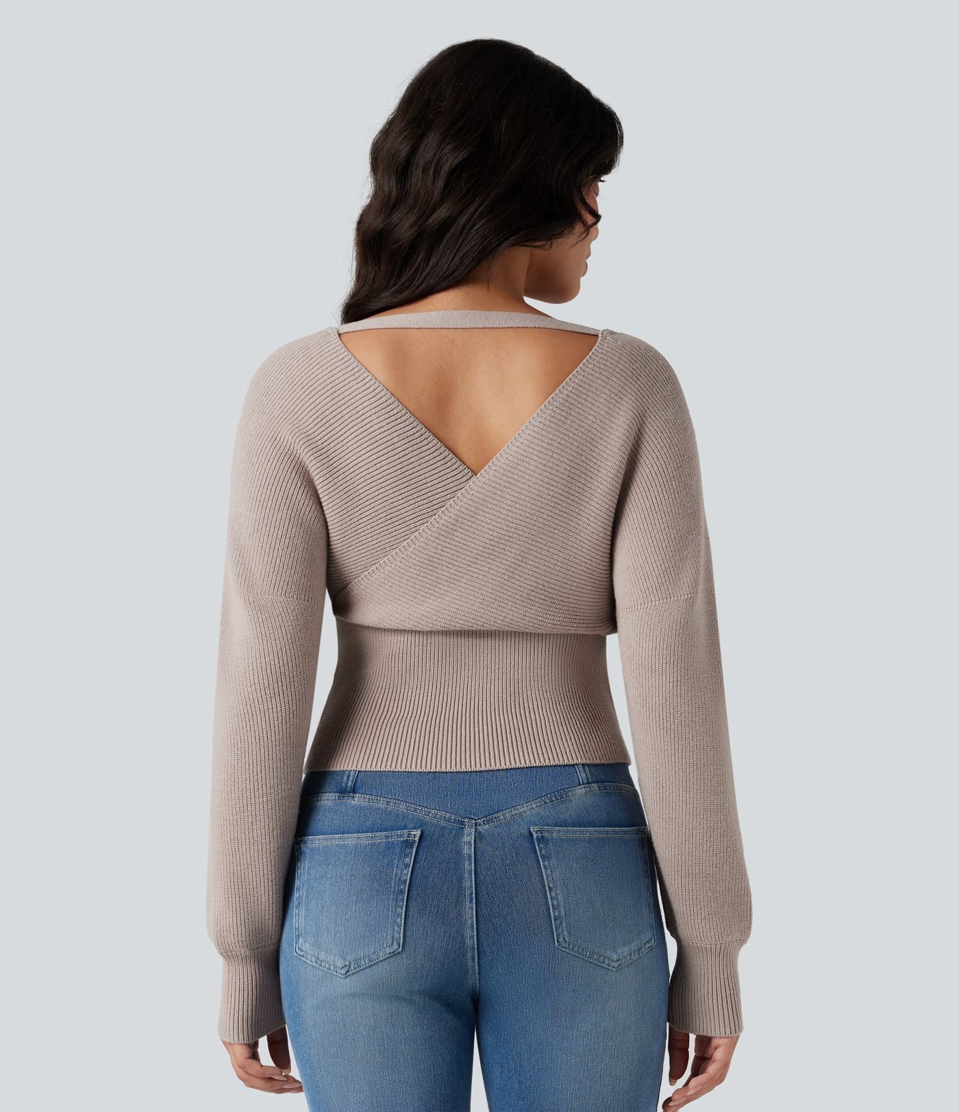 Pull col V manches chauve-souris longues à découpes