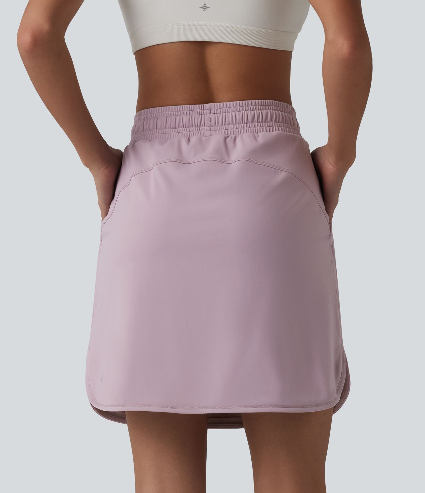 Jupe de sport 2 en 1 SoftlyZero™ Airy, taille mi-haute, ourlet incurvé et cordon de serrage, avec poches