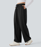Pantalon de yoga tissu gaufré taille mi-haute jambe droite avec cordon de serrage et poches