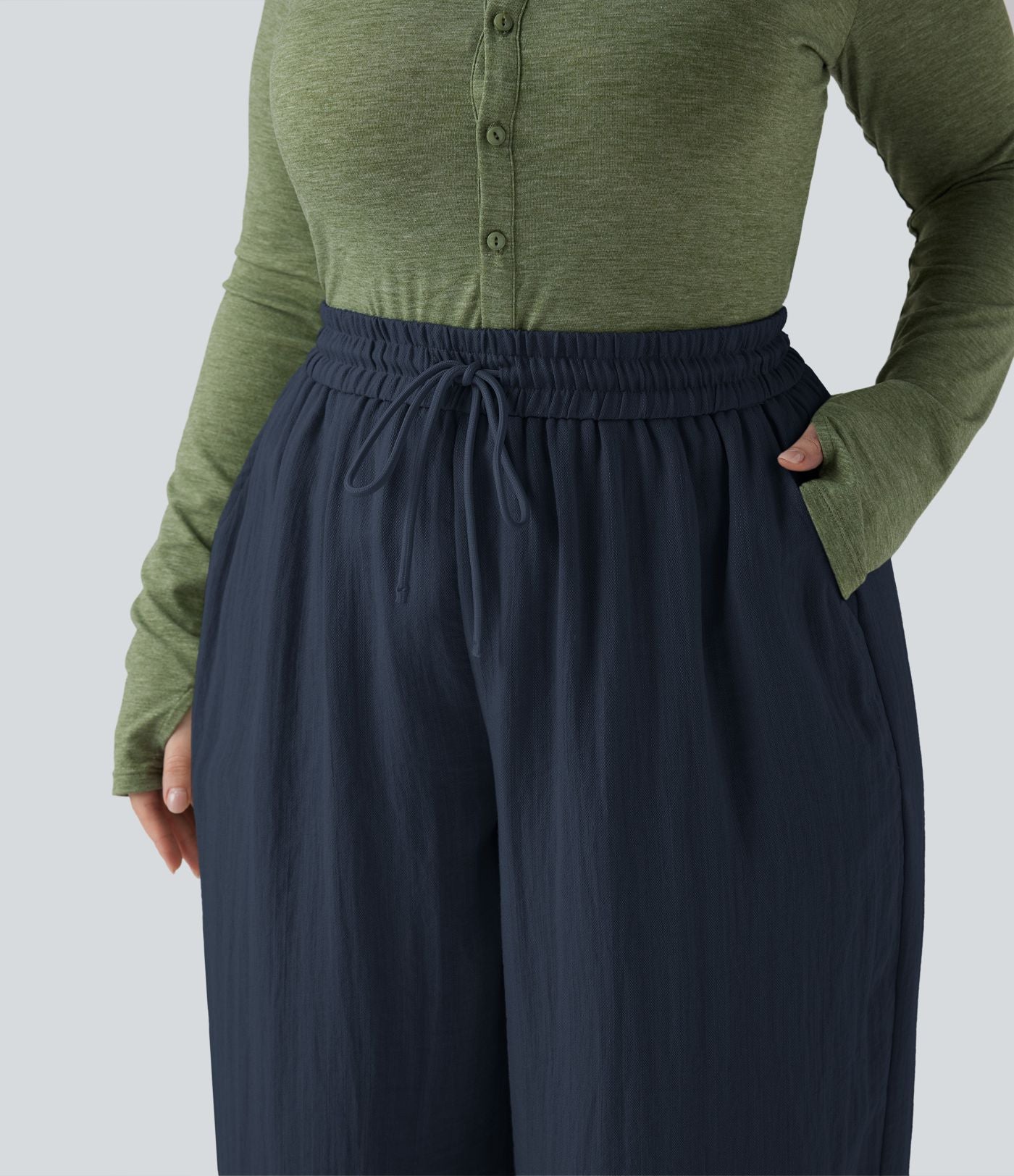 Pantalon grande taille large fluide taille haute avec cordon de serrage, poches et aspect lin