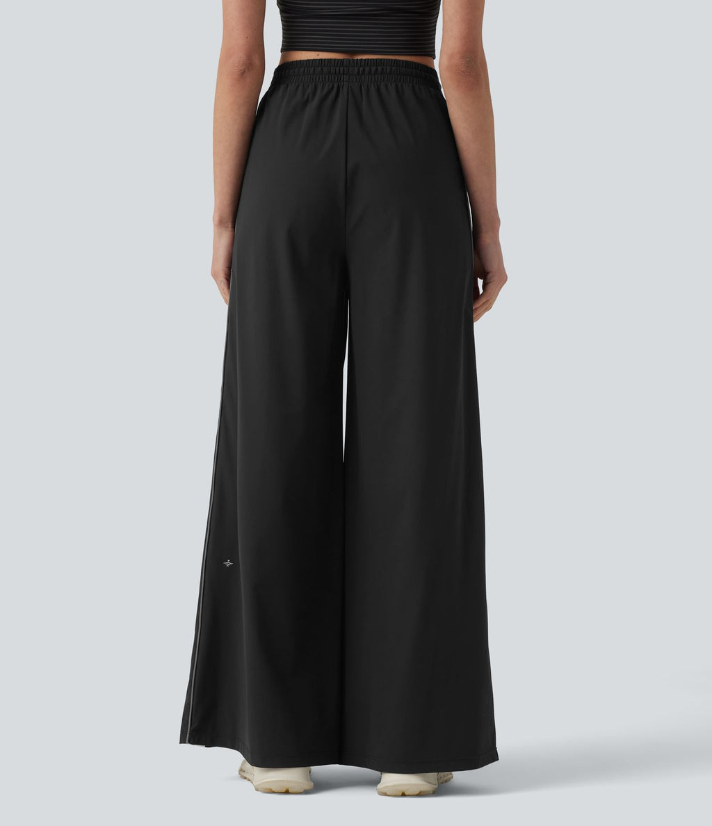 Pantalon running large à rayures taille haute avec cordon de serrage, séchage rapide et effet frais InstantCool avec poches, protection solaire UPF40+