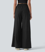 Pantalon running large à rayures taille haute avec cordon de serrage, séchage rapide et effet frais InstantCool avec poches, protection solaire UPF40+