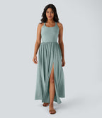 Robe longue fluide fendue avec poches latérales, dos nu et effet torsadé
