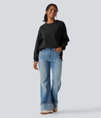 Sweat-shirt gaufré col rond ourlet fendu manches longues