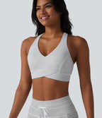 Brassière de sport col V dos nageur maintien moyen à rayures