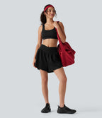Short de running 2-en-1 taille haute croisée en tissu froissé avec ourlet fendu et poches
