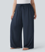 Pantalon décontracté grande taille large fluide taille haute effet lin avec cordon de serrage et poches