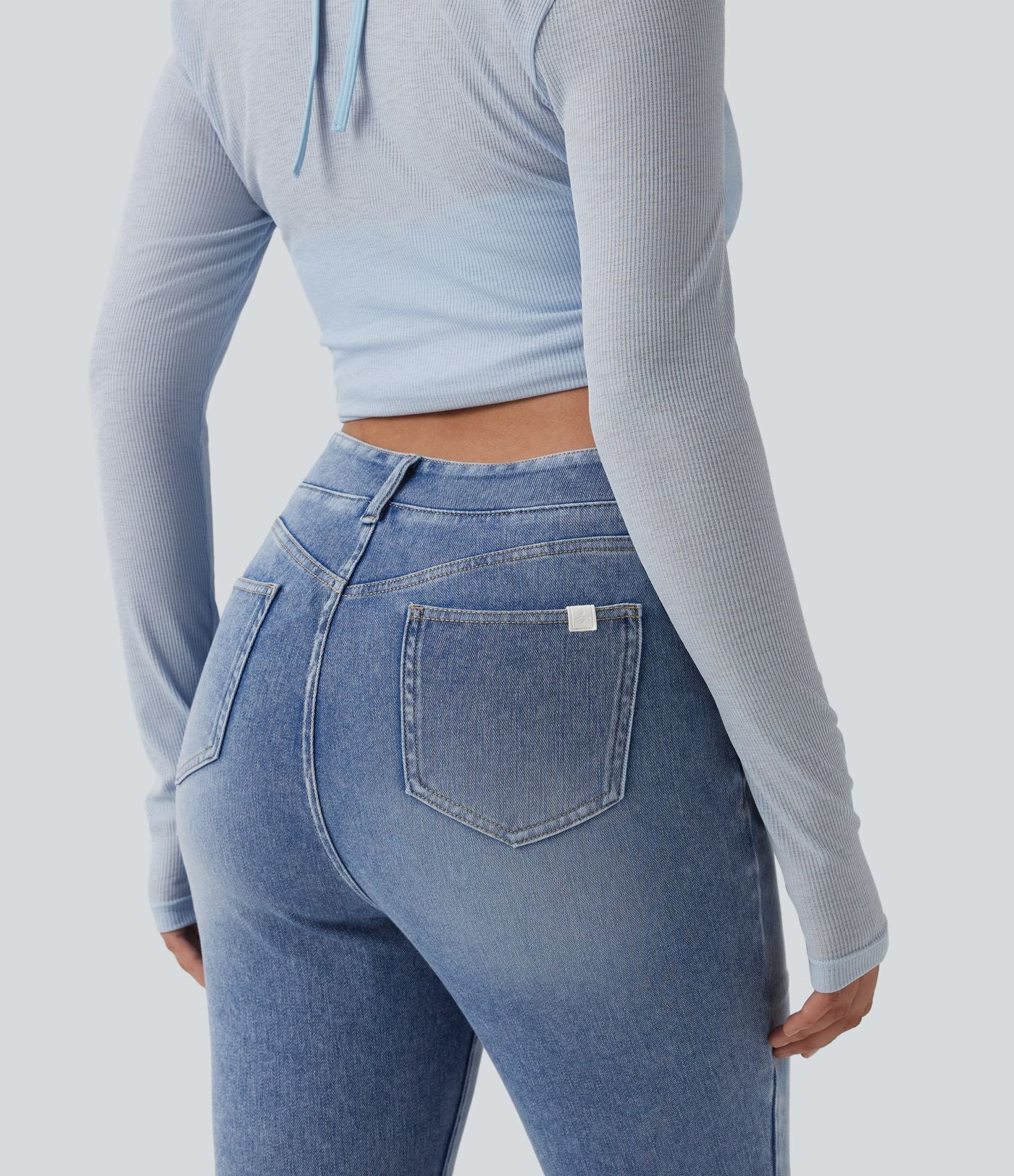 Halara Flex™ Jean 7/8 slim asymétrique taille haute croisée avec poches